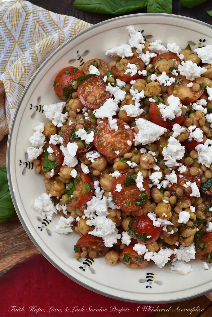 Pearl Couscous & Chickpea Salad with Basil - This easy-to-make side dish truly takes advantage of when fresh basil and cherry or grape tomatoes are in season. Add in chickpeas or garbanzo beans, pearl couscous, and a simple balsamic vinaigrette for a salad that pairs well with almost any summer meal. Oh, and don't forget the crumbled feta, because cheese makes every summer salad side dish even more irresistible.