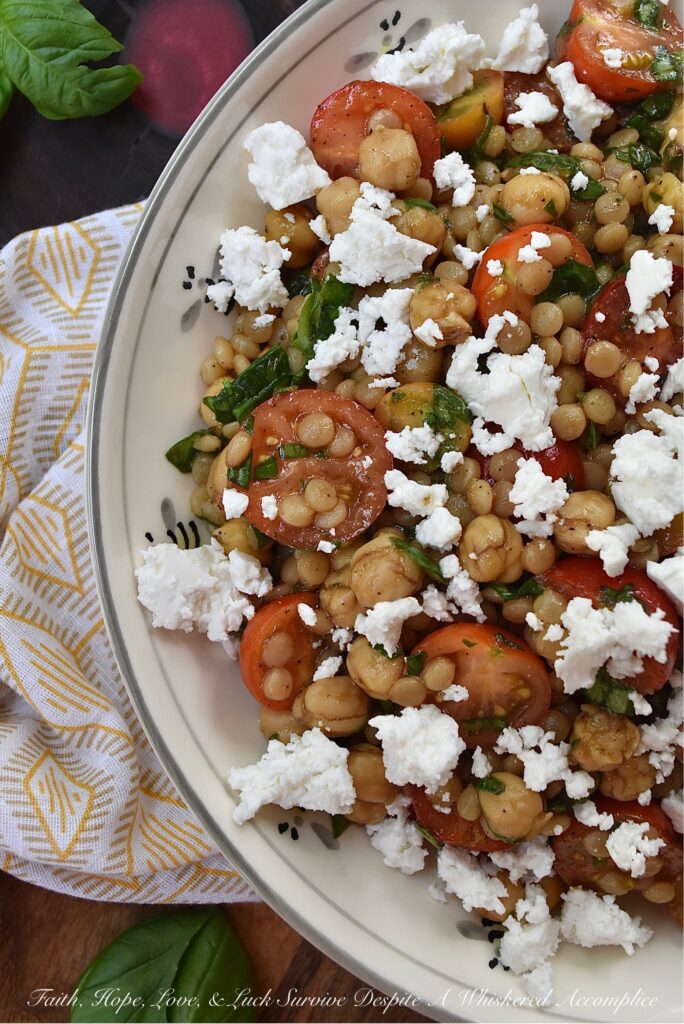 Pearl Couscous & Chickpea Salad with Basil - This easy-to-make side dish truly takes advantage of when fresh basil and cherry or grape tomatoes are in season. Add in chickpeas or garbanzo beans, pearl couscous, and a simple balsamic vinaigrette for a salad that pairs well with almost any summer meal. Oh, and don't forget the crumbled feta, because cheese makes every summer salad side dish even more irresistible.
