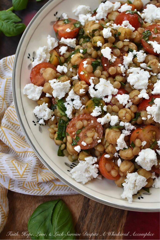 Pearl Couscous & Chickpea Salad with Basil - This easy-to-make side dish truly takes advantage of when fresh basil and cherry or grape tomatoes are in season. Add in chickpeas or garbanzo beans, pearl couscous, and a simple balsamic vinaigrette for a salad that pairs well with almost any summer meal. Oh, and don't forget the crumbled feta, because cheese makes every summer salad side dish even more irresistible.
