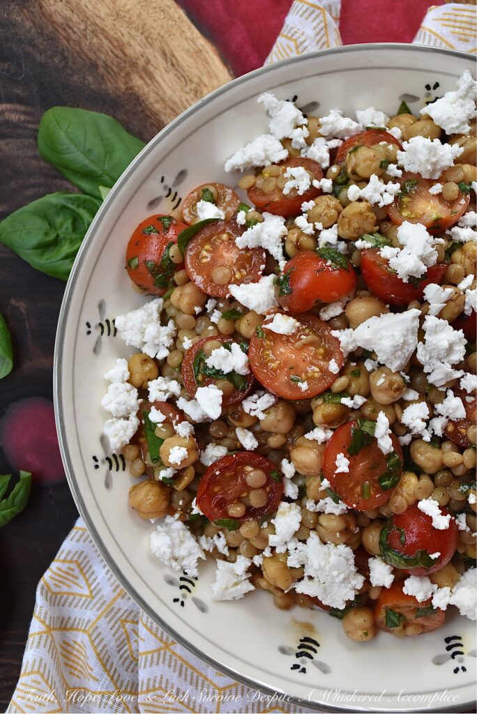 Pearl Couscous & Chickpea Salad with Basil - This easy-to-make side dish truly takes advantage of when fresh basil and cherry or grape tomatoes are in season. Add in chickpeas or garbanzo beans, pearl couscous, and a simple balsamic vinaigrette for a salad that pairs well with almost any summer meal. Oh, and don't forget the crumbled feta, because cheese makes every summer salad side dish even more irresistible.