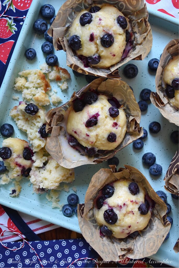 Blueberry-Topped Lemon Ricotta Muffins - These luscious lemon ricotta muffins are everything you could ever desire a muffin to be. Lemony, rich, tender, studded with fresh blueberries, and dripping in a sweet lemon glaze. Plus, they’re a muffin recipe you won’t even have to drag the mixer out for. Does it get any better?