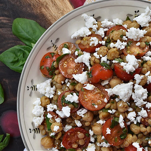 Pearl Couscous & Chickpea Salad with Basil - Favorite Summertime Pasta Salad Recipes - What would summertime be without an enormous bowl of creamy homemade pasta salad? They're easy to make, can be made for almost any sized crowd, taste so much better than store-bought, and can be made to fit almost any budget. Here, you'll find some of our favorite summer macaroni, tortellini, and couscous pasta salad recipes, just perfect for your next cookout, picnic, reunion, pool party, or barbeque get-together.