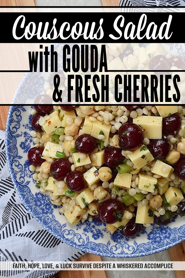 Couscous Salad with Gouda & Fresh Cherries - Ditch your traditional pasta salad recipe and switch things up for once with this colorful, fresh, and flavorful couscous salad. This unique pearl or Israeli couscous side dish uses fresh cherries, cubed gouda, canned chickpeas, and a fresh basil vinaigrette to add lots of bold and bright flavors.
