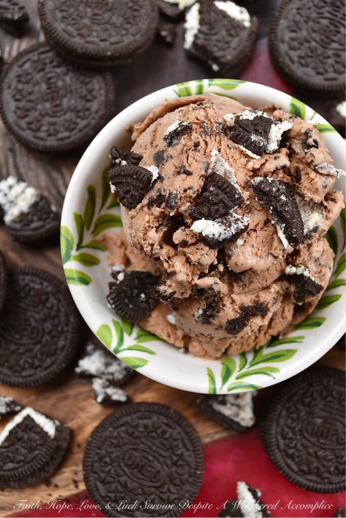 Cookies & Cream Chocolate Ricotta Ice Cream - This creamy chocolate ricotta ice cream is practically overflowing with crushed chocolate sandwich cookies, making it a true dream come true frozen treat for any cookies and cream aficionado. And, one thing's for sure, since its creamy ricotta base is infused with rich cocoa powder and melted milk chocolate, giving it a deep, super-chocolaty flavor, this kicked-up classic flavor is sure to become an instant new cookies and cream ice cream favorite.