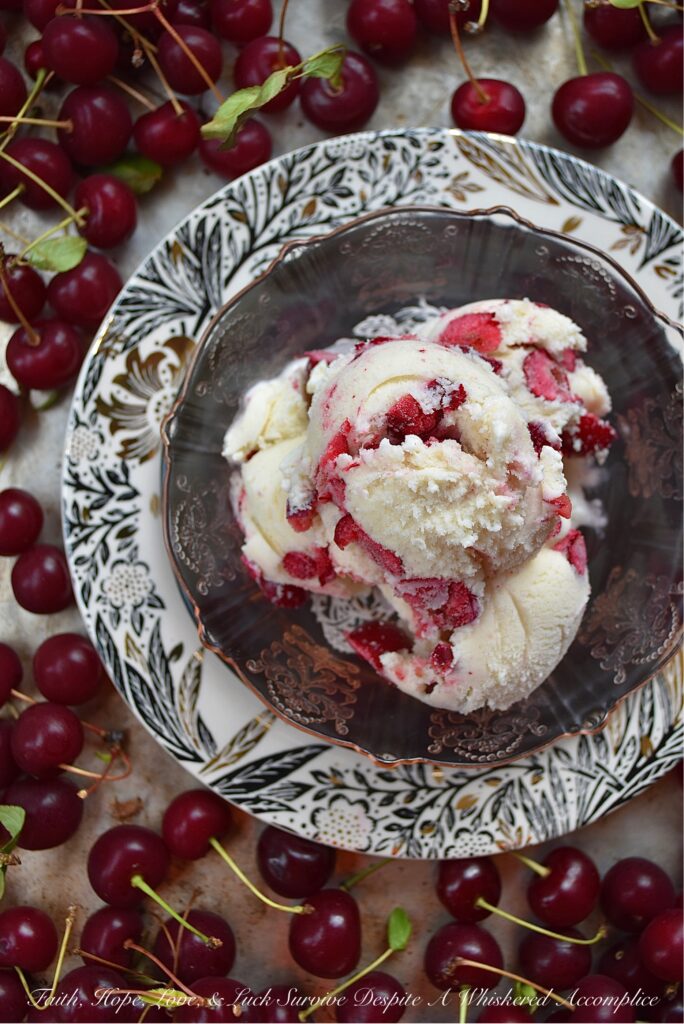 Vanilla Bean Ice Cream with Sour Cherries - Is there anything better than vanilla ice cream? Yes, this homemade vanilla ice cream with vanilla extract and vanilla bean seeds, practically overflowing with a generous amount of in-season sour cherries. This vanilla bean sour cherry ice cream is sweet, tart, and fruity, not to mention one of the best ways to enjoy sour cherries before they disappear for yet another year. So, grab your ice cream machine and get ready to churn up some sour cherry deliciousness.