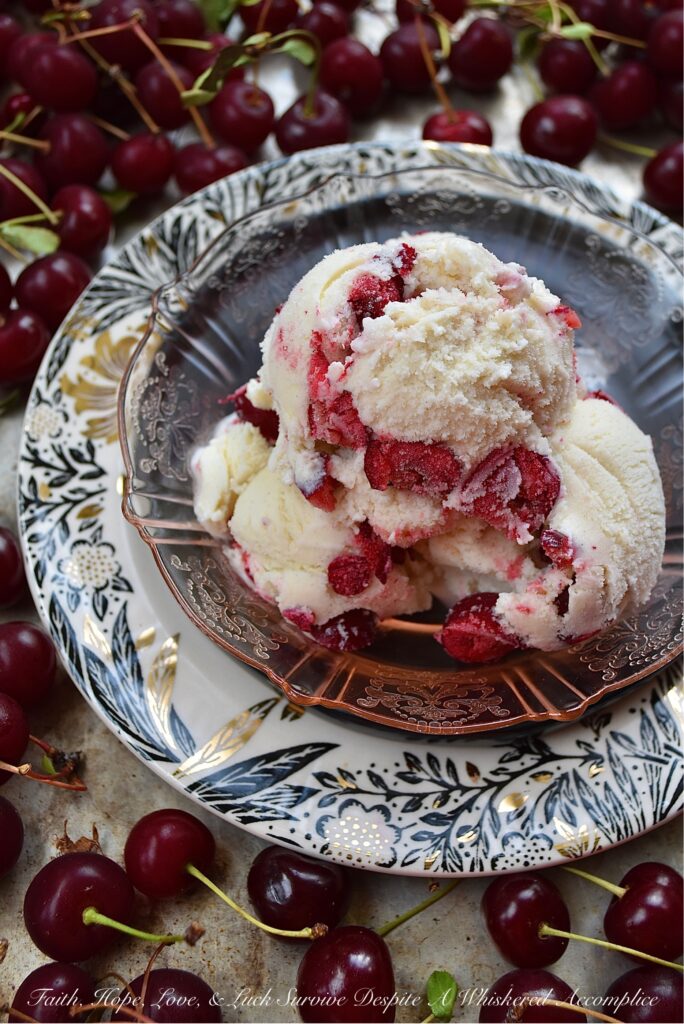 Vanilla Bean Ice Cream with Sour Cherries - Is there anything better than vanilla ice cream? Yes, this homemade vanilla ice cream with vanilla extract and vanilla bean seeds, practically overflowing with a generous amount of in-season sour cherries. This vanilla bean sour cherry ice cream is sweet, tart, and fruity, not to mention one of the best ways to enjoy sour cherries before they disappear for yet another year. So, grab your ice cream machine and get ready to churn up some sour cherry deliciousness.