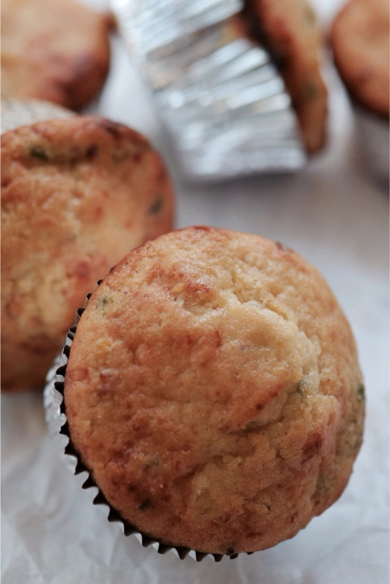 Chipotle Cheddar Cornbread Muffins - When it comes to making the perfect cornbread muffins, there is a little secret that takes them from good to great. Folding in a generous amount of corn that has been sautéed with bacon, scallions, and heavy whipping cream. To balance the sweet creamy corn, bacon, and scallion mixture, these muffins also have both chipotle powder and chipotles in adobo sauce for a nice added kick. The result is a delicious, savory cornbread muffin that is sure to please even the pickiest of eaters.