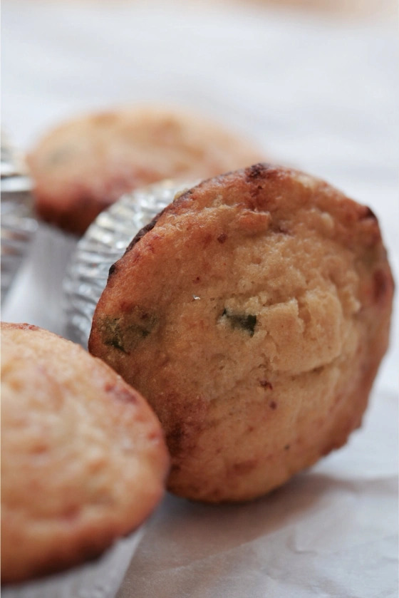 Chipotle Cheddar Cornbread Muffins - When it comes to making the perfect cornbread muffins, there is a little secret that takes them from good to great. Folding in a generous amount of corn that has been sautéed with bacon, scallions, and heavy whipping cream. To balance the sweet creamy corn, bacon, and scallion mixture, these muffins also have both chipotle powder and chipotles in adobo sauce for a nice added kick. The result is a delicious, savory cornbread muffin that is sure to please even the pickiest of eaters.