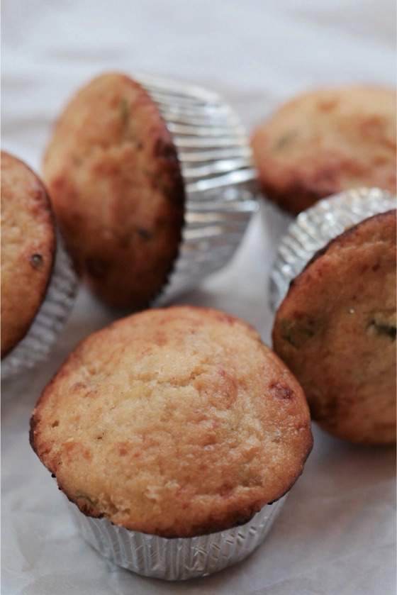 Chipotle Cheddar Cornbread Muffins - When it comes to making the perfect cornbread muffins, there is a little secret that takes them from good to great. Folding in a generous amount of corn that has been sautéed with bacon, scallions, and heavy whipping cream. To balance the sweet creamy corn, bacon, and scallion mixture, these muffins also have both chipotle powder and chipotles in adobo sauce for a nice added kick. The result is a delicious, savory cornbread muffin that is sure to please even the pickiest of eaters.
