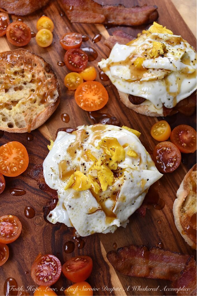 Whiskey Maple Butter Bacon, Egg, & Cheese - When it comes to a bacon, egg, and cheese sandwich, there's just something about the combination of salty bacon, gooey cheese, and a perfectly cooked egg that always hits the spot. However, when you drizzle the same breakfast sandwich with maple whiskey butter sauce, it instantly takes the whole sandwich to a whole new level. It's the perfect early morning combination of savory and sweet.
