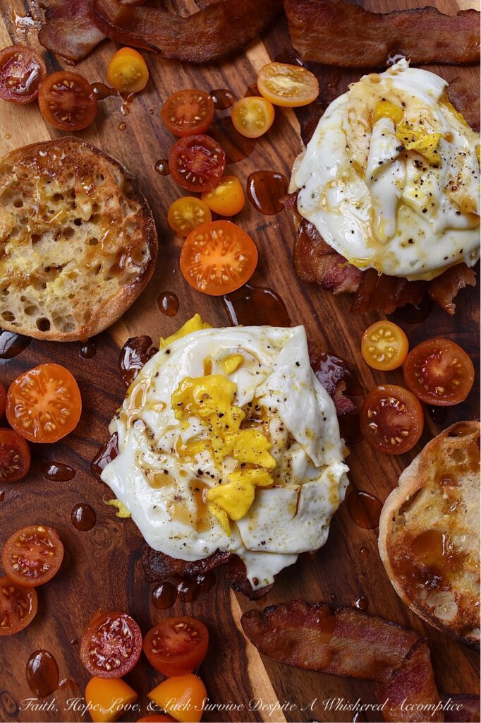 Whiskey Maple Butter Bacon, Egg, & Cheese - When it comes to a bacon, egg, and cheese sandwich, there's just something about the combination of salty bacon, gooey cheese, and a perfectly cooked egg that always hits the spot. However, when you drizzle the same breakfast sandwich with maple whiskey butter sauce, it instantly takes the whole sandwich to a whole new level. It's the perfect early morning combination of savory and sweet.
