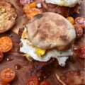 Whiskey Maple Butter Bacon, Egg, & Cheese - When it comes to a bacon, egg, and cheese sandwich, there's just something about the combination of salty bacon, gooey cheese, and a perfectly cooked egg that always hits the spot. However, when you drizzle the same breakfast sandwich with maple whiskey butter sauce, it instantly takes the whole sandwich to a whole new level. It's the perfect early morning combination of savory and sweet.