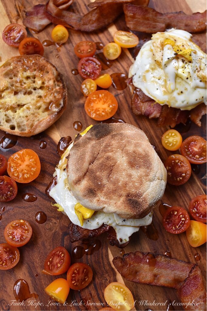 Whiskey Maple Butter Bacon, Egg, & Cheese - When it comes to a bacon, egg, and cheese sandwich, there's just something about the combination of salty bacon, gooey cheese, and a perfectly cooked egg that always hits the spot. However, when you drizzle the same breakfast sandwich with maple whiskey butter sauce, it instantly takes the whole sandwich to a whole new level. It's the perfect early morning combination of savory and sweet.