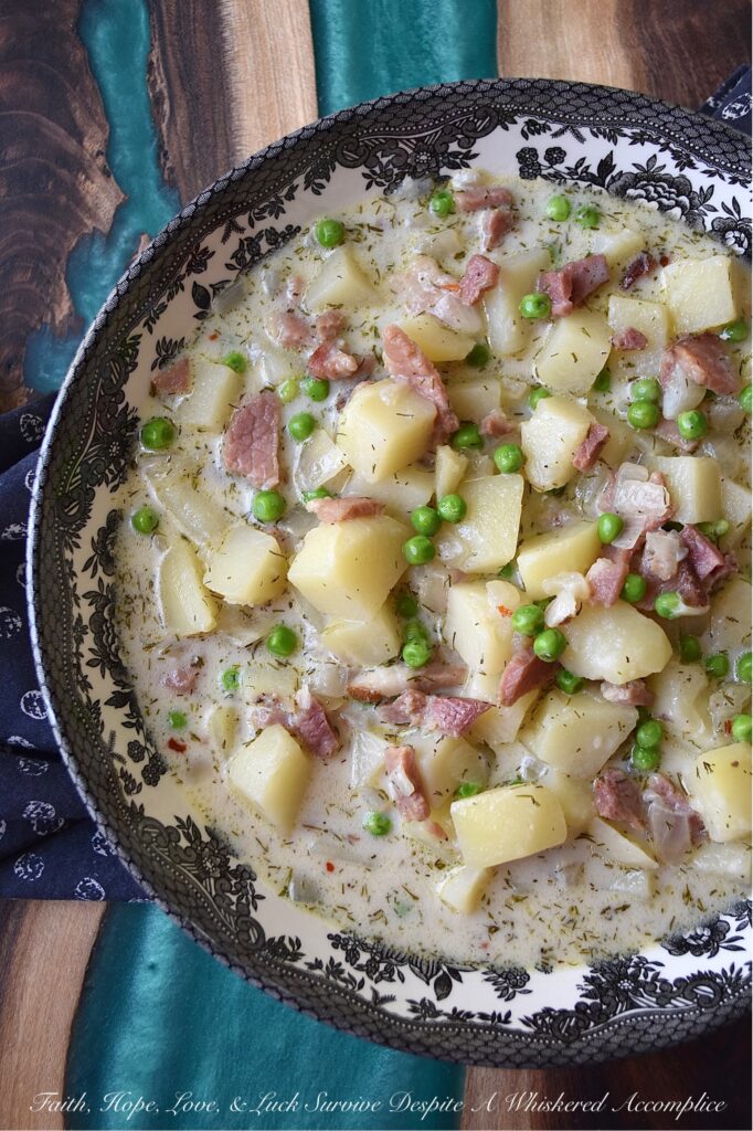 Potato & Onion Soup with Ham, Peas, & Dill - Potato and onion soup is the perfect comfort food, no matter what time of year it is. Whether it's spring, summer, fall, or winter, this simple and delicious soup always hits the spot with its savory diced ham, sweet frozen peas, and fragrant dried dill. And with both half and half and dry sherry in the recipe, you can't help but fall in love with its rich and creamy goodness. No matter what time of year, this potato and onion soup is sure to please.