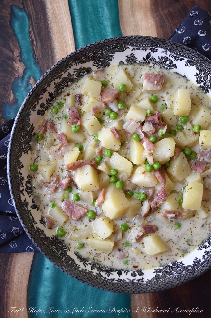 Potato & Onion Soup with Ham, Peas, & Dill - Potato and onion soup is the perfect comfort food, no matter what time of year it is. Whether it's spring, summer, fall, or winter, this simple and delicious soup always hits the spot with its savory diced ham, sweet frozen peas, and fragrant dried dill. And with both half and half and dry sherry in the recipe, you can't help but fall in love with its rich and creamy goodness. No matter what time of year, this potato and onion soup is sure to please.