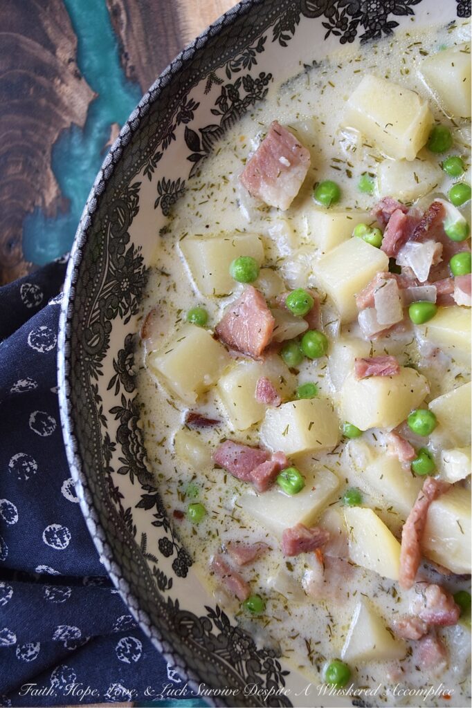 Potato & Onion Soup with Ham, Peas, & Dill - Potato and onion soup is the perfect comfort food, no matter what time of year it is. Whether it's spring, summer, fall, or winter, this simple and delicious soup always hits the spot with its savory diced ham, sweet frozen peas, and fragrant dried dill. And with both half and half and dry sherry in the recipe, you can't help but fall in love with its rich and creamy goodness. No matter what time of year, this potato and onion soup is sure to please.