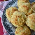 Green Tomato & Cheddar Drop Biscuits - These savory summer drop biscuits are easy to make and require no kneading or rolling. Made with grated green tomato and shredded white cheddar cheese, these biscuits are mildly sweet, cheesy, and full of flavor. They're also seasoned with paprika and melted butter, which gives them a lovely golden appearance and a nice, crispy texture. Summer won't last forever, so make sure to bake up a batch of these biscuits before all of this year's green tomatoes disappear.