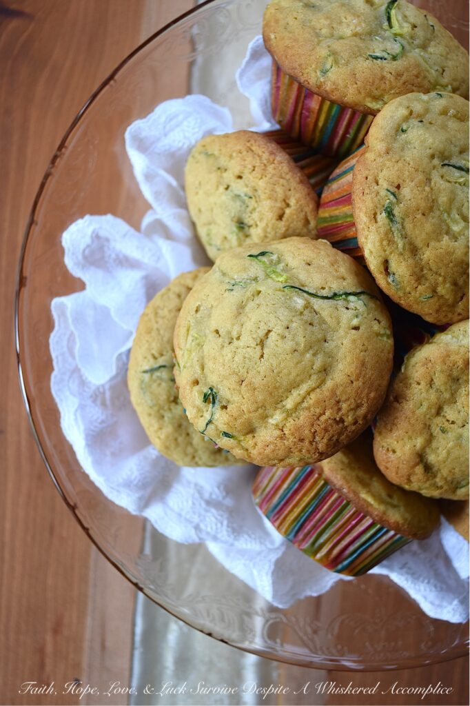 Vanilla Pudding Zucchini Bread Muffins - When you have way too many zucchini in your garden and you don't know what to do with all of them, try making these super-moist zucchini bread muffins. All you need is a box of vanilla pudding mix, some grated zucchini, eggs, oil, and a few other simple ingredients. These sweet, moist, and absolutely delicious vanilla pudding zucchini bread muffins are the perfect way to use up your stash of summer zucchini.