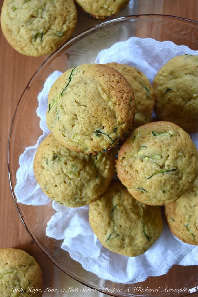 Vanilla Pudding Zucchini Bread Muffins - When you have way too many zucchini in your garden and you don't know what to do with all of them, try making these super-moist zucchini bread muffins. All you need is a box of vanilla pudding mix, some grated zucchini, eggs, oil, and a few other simple ingredients. These sweet, moist, and absolutely delicious vanilla pudding zucchini bread muffins are the perfect way to use up your stash of summer zucchini.