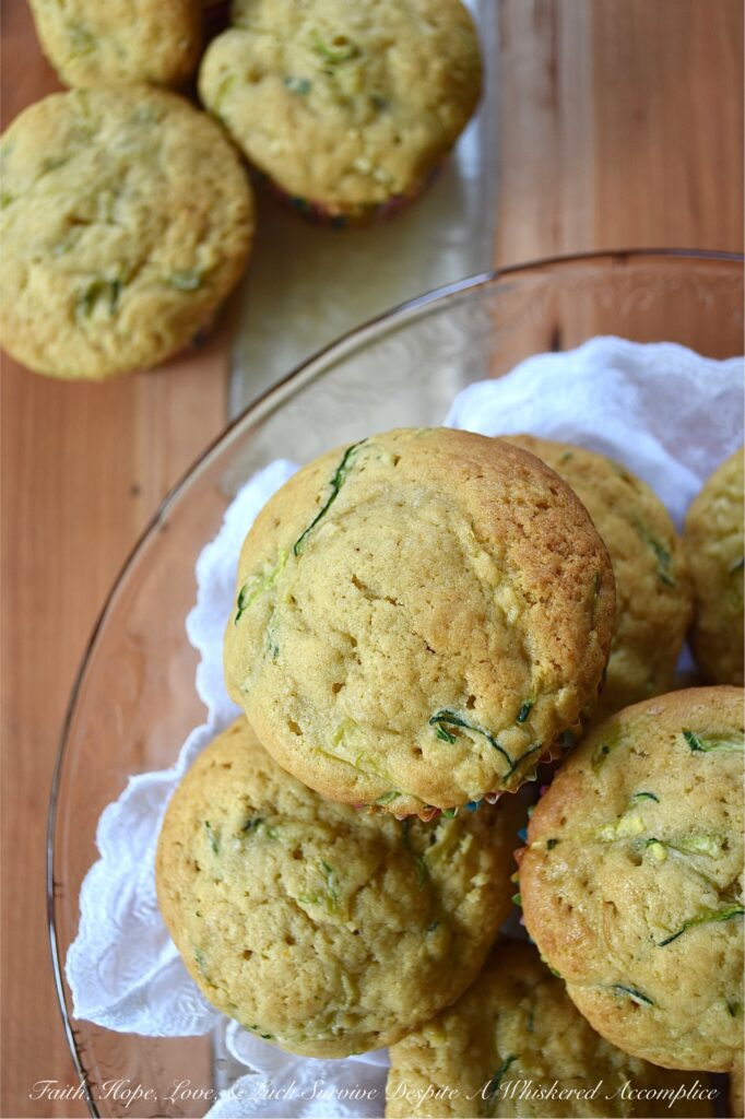 Vanilla Pudding Zucchini Bread Muffins - When you have way too many zucchini in your garden and you don't know what to do with all of them, try making these super-moist zucchini bread muffins. All you need is a box of vanilla pudding mix, some grated zucchini, eggs, oil, and a few other simple ingredients. These sweet, moist, and absolutely delicious vanilla pudding zucchini bread muffins are the perfect way to use up your stash of summer zucchini.