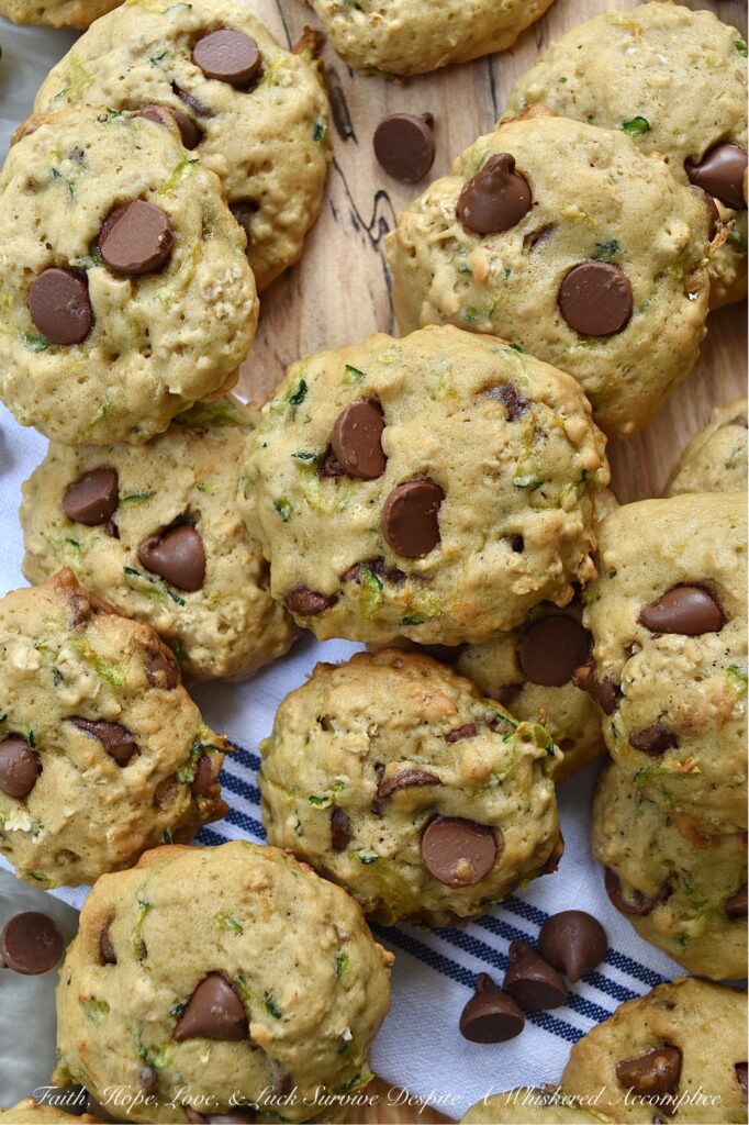 Soft Zucchini Milk Chocolate Chip Cookies - If you're looking for a delicious recipe to help you make the most of your summer zucchini harvest, this is the recipe for you. These soft, pillowy zucchini cookies made with milk chocolate chips couldn't be more perfect. The moist grated zucchini adds a delightful texture and flavor to these cookies. Whether you're looking for a sweet dessert to bring to a picnic, barbecue, or party or perhaps just a treat for yourself, these cookies are sure to be a hit.