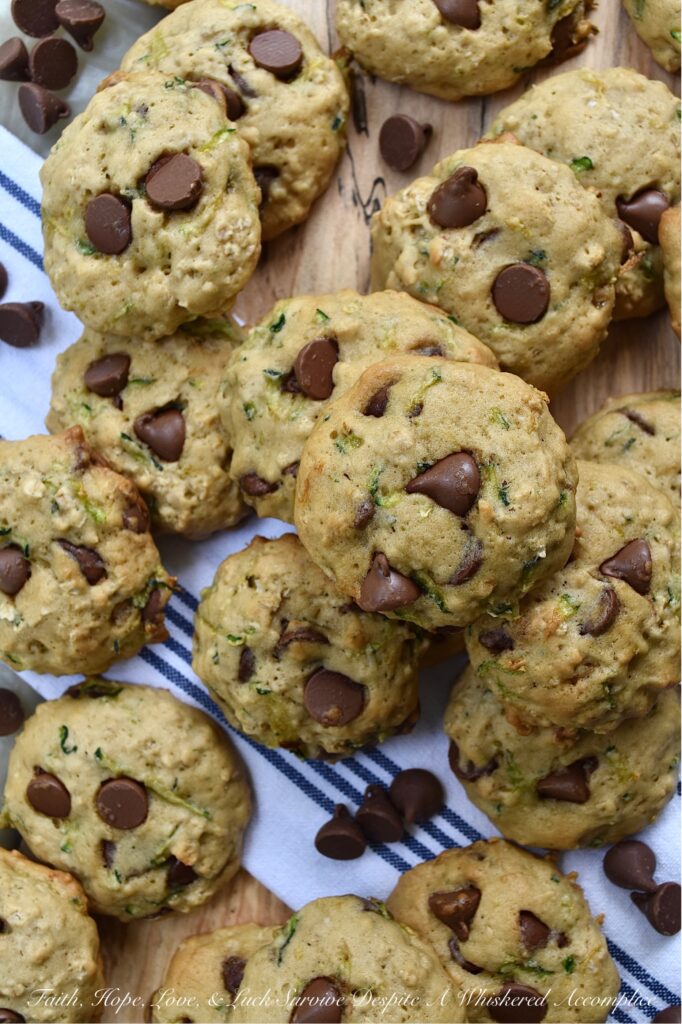 Soft Zucchini Milk Chocolate Chip Cookies - If you're looking for a delicious recipe to help you make the most of your summer zucchini harvest, this is the recipe for you. These soft, pillowy zucchini cookies made with milk chocolate chips couldn't be more perfect. The moist grated zucchini adds a delightful texture and flavor to these cookies. Whether you're looking for a sweet dessert to bring to a picnic, barbecue, or party or perhaps just a treat for yourself, these cookies are sure to be a hit.