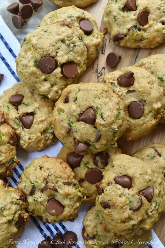 Soft Zucchini Milk Chocolate Chip Cookies - If you're looking for a delicious recipe to help you make the most of your summer zucchini harvest, this is the recipe for you. These soft, pillowy zucchini cookies made with milk chocolate chips couldn't be more perfect. The moist grated zucchini adds a delightful texture and flavor to these cookies. Whether you're looking for a sweet dessert to bring to a picnic, barbecue, or party or perhaps just a treat for yourself, these cookies are sure to be a hit.