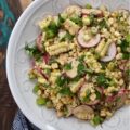 Smoky Cilantro Creamy Corn & Radish Salad - The combination of flavors and textures in this creamy corn and radish vegetable salad is simply delicious. The smoky chili and cumin spices in the creamy mayonnaise-based cilantro dressing give this salad a nice kick, while the corn's sweetness and the sliced radishes' crunch provide a perfect flavor balance. This is a must-try summer vegetable side dish for when you're craving something fresh and flavorful, with a delightful crunchy texture.
