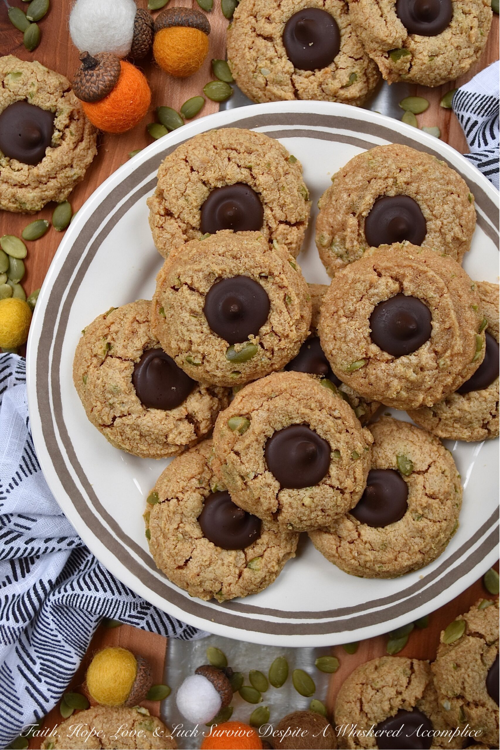 Flourless Pumpkin Seed Peanut Butter Blossoms