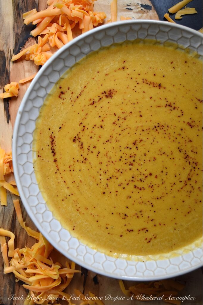 Crockpot Mexican Butternut Squash Soup - This butternut squash soup is a delicious and easy Mexican-inspired meal that can be made in either a crockpot or a slow cooker. Diced butternut squash is combined with chicken broth, green chile enchilada sauce, and homemade taco seasoning. After slowly cooking for 8 hours on low heat, heavy whipping cream is added, and then the soup is blended until smooth and creamy. If you love tacos, then you'll definitely love this amazing Mexican crockpot soup.