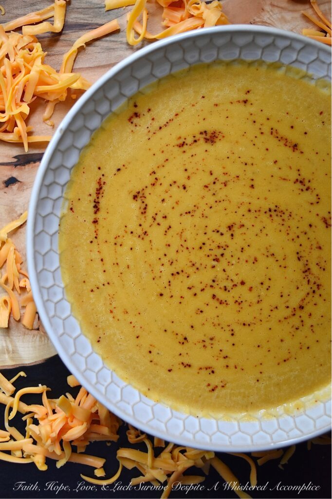 Crockpot Mexican Butternut Squash Soup - This butternut squash soup is a delicious and easy Mexican-inspired meal that can be made in either a crockpot or a slow cooker. Diced butternut squash is combined with chicken broth, green chile enchilada sauce, and homemade taco seasoning. After slowly cooking for 8 hours on low heat, heavy whipping cream is added, and then the soup is blended until smooth and creamy. If you love tacos, then you'll definitely love this amazing Mexican crockpot soup.