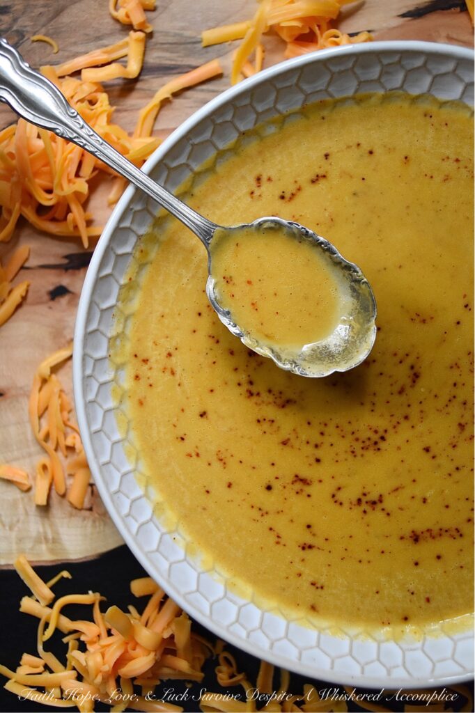 Crockpot Mexican Butternut Squash Soup - This butternut squash soup is a delicious and easy Mexican-inspired meal that can be made in either a crockpot or a slow cooker. Diced butternut squash is combined with chicken broth, green chile enchilada sauce, and homemade taco seasoning. After slowly cooking for 8 hours on low heat, heavy whipping cream is added, and then the soup is blended until smooth and creamy. If you love tacos, then you'll definitely love this amazing Mexican crockpot soup.