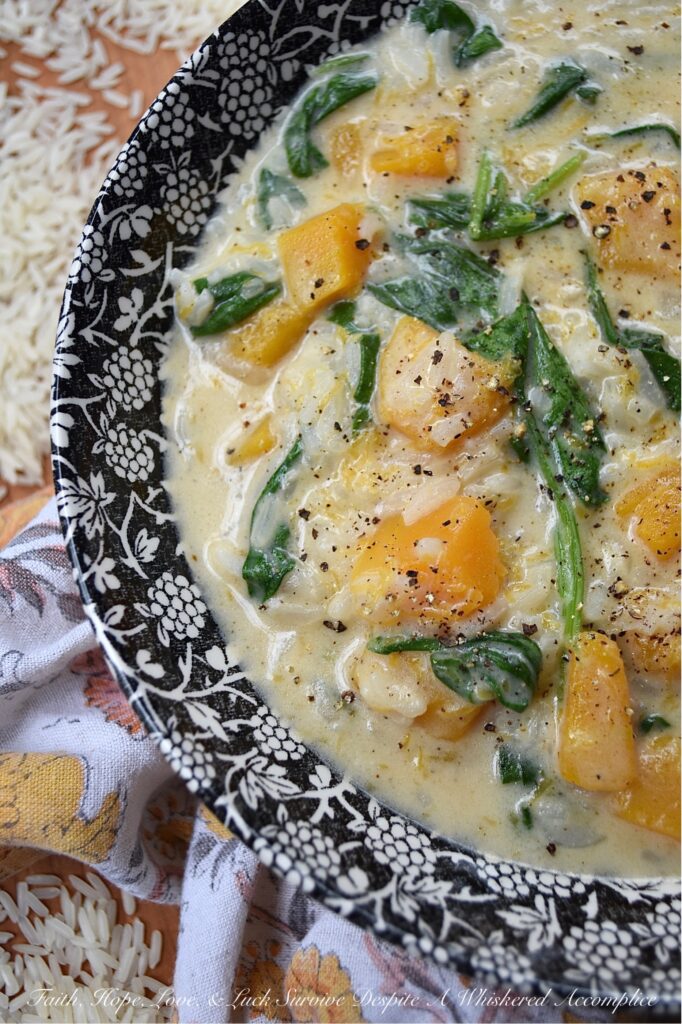 Creamy Parmesan Butternut Squash Rice Soup - This creamy one-pot soup recipe is so easy to make and requires very few ingredients. Butternut squash, jasmine rice, baby spinach, and parmesan cheese all come together to create a comforting, rich, and flavorful cheesy soup that's perfect for any chilly evening. And, the best part is, that it doesn't take much time to prepare, which means that this is the perfect cold weather weeknight meal.