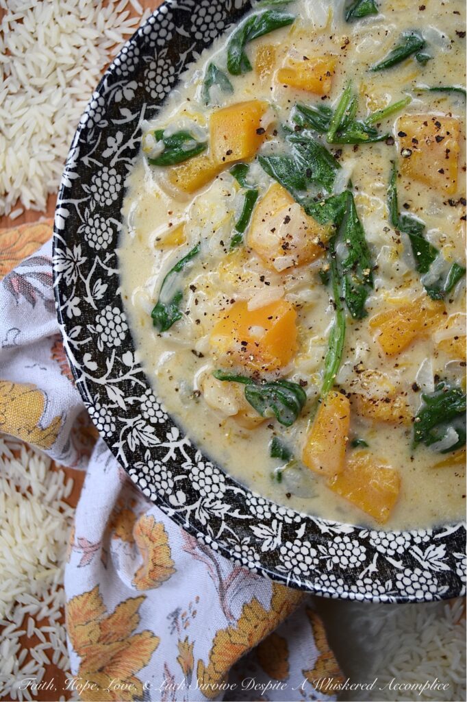 Creamy Parmesan Butternut Squash Rice Soup - This creamy one-pot soup recipe is so easy to make and requires very few ingredients. Butternut squash, jasmine rice, baby spinach, and parmesan cheese all come together to create a comforting, rich, and flavorful cheesy soup that's perfect for any chilly evening. And, the best part is, that it doesn't take much time to prepare, which means that this is the perfect cold weather weeknight meal.