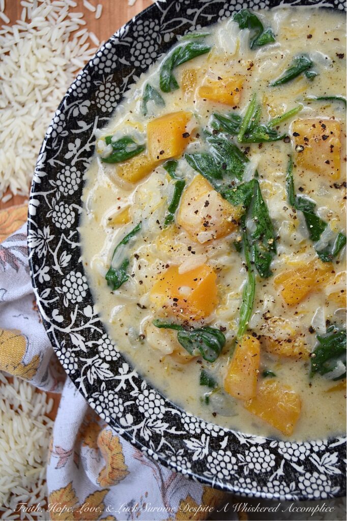 Creamy Parmesan Butternut Squash Rice Soup - This creamy one-pot soup recipe is so easy to make and requires very few ingredients. Butternut squash, jasmine rice, baby spinach, and parmesan cheese all come together to create a comforting, rich, and flavorful cheesy soup that's perfect for any chilly evening. And, the best part is, that it doesn't take much time to prepare, which means that this is the perfect cold weather weeknight meal.