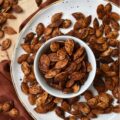Buttery Chili Roasted Pumpkin Seeds - Fall is the perfect time of year to enjoy a seasonal snack with a hint of salt and a slightly spicy chili kick, so make sure you don't throw away your pumpkin seeds after you carve your pumpkins this year. After these pumpkin seeds are boiled in salted water they are then oven-roasted with melted butter, chili powder, and onion powder. Once they're finished baking, sprinkle the roasted pumpkin seeds with a bit of sea salt for the perfect savory nibble. Enjoy these pumpkin seeds as a snack during the fall months, or use them to garnish a comforting bowl of pumpkin soup or a fresh garden salad topped with dried cranberries and diced apples.