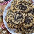 Ginger's Cherry Chocolate Chip Sprinkle Cookies - Chocolate chip cookies are everyone's favorite, and this cookie recipe is one that my mom, Ginger, would have loved at first bite. These delicious cookies are loaded with miniature semi-sweet chocolate chips, chocolate sprinkles, and dried sweetened cherries, making them the perfect combination of crunchy and chewy. If you're someone who loves chocolaty cookies with lots of texture, these are the cookies for you.