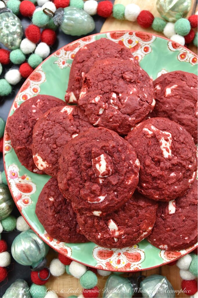 White Chocolate Red Velvet Cake Mix Cookies - Cake mix cookies are a delicious way to enjoy a sweet treat without having to spend a lot of time in the kitchen. These red velvet cake mix cookies are soft, cakey, and absolutely delicious. Plus, the addition of chopped white chocolate to the cookie dough gives these vibrant red velvet cookies a festive red-and-white color combination that's perfect for the holidays.