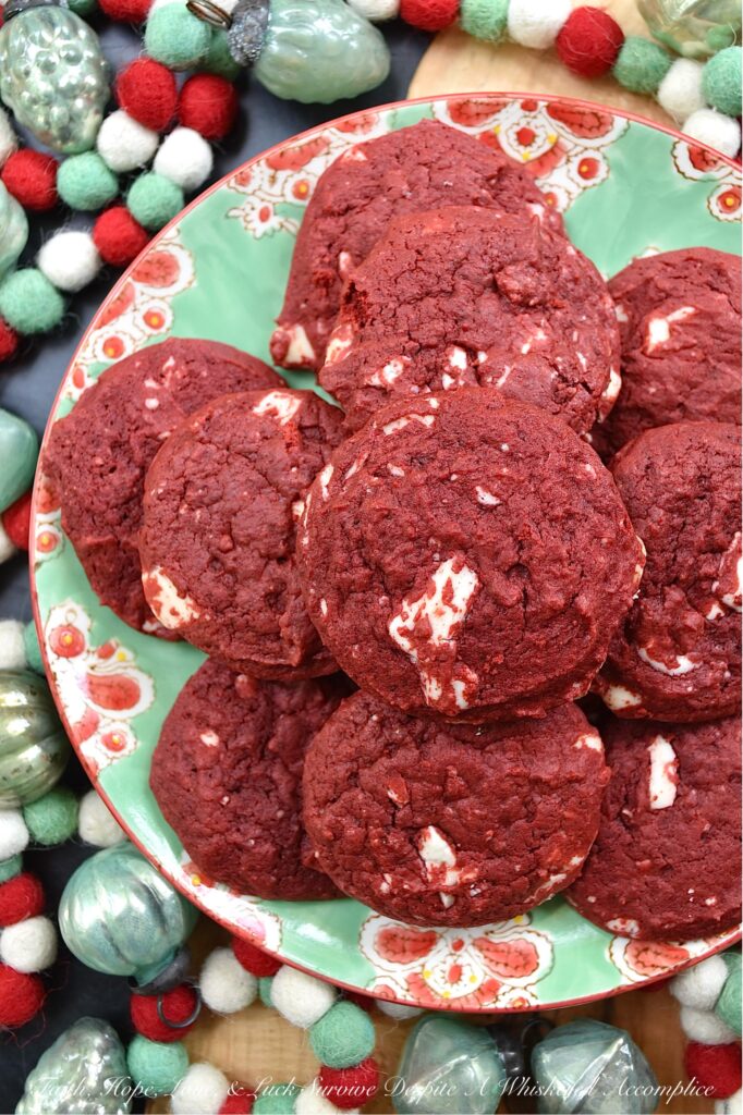 White Chocolate Red Velvet Cake Mix Cookies - Cake mix cookies are a delicious way to enjoy a sweet treat without having to spend a lot of time in the kitchen. These red velvet cake mix cookies are soft, cakey, and absolutely delicious. Plus, the addition of chopped white chocolate to the cookie dough gives these vibrant red velvet cookies a festive red-and-white color combination that's perfect for the holidays.