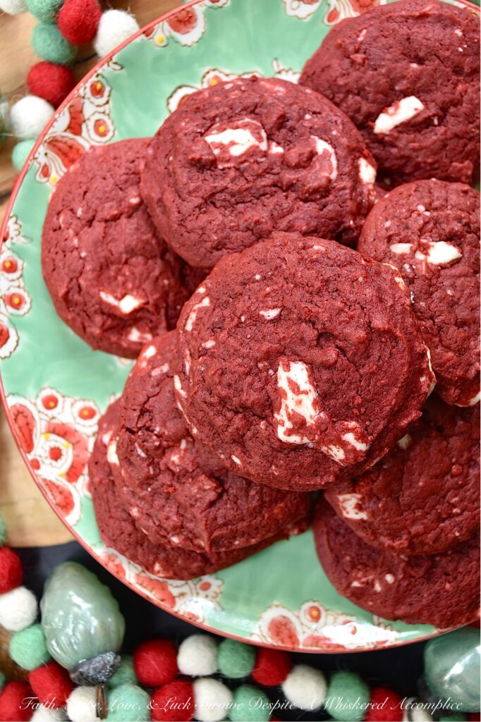 White Chocolate Red Velvet Cake Mix Cookies - Cake mix cookies are a delicious way to enjoy a sweet treat without having to spend a lot of time in the kitchen. These red velvet cake mix cookies are soft, cakey, and absolutely delicious. Plus, the addition of chopped white chocolate to the cookie dough gives these vibrant red velvet cookies a festive red-and-white color combination that's perfect for the holidays.