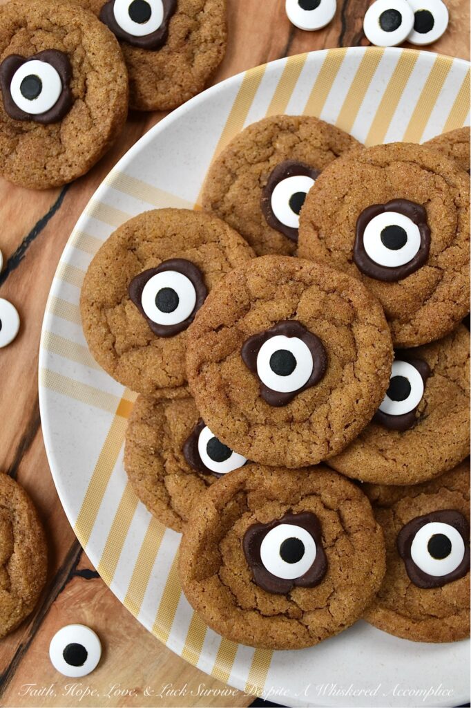 Cinnamon Sugar Pumpkin Cyclops Cookies - These soft, chewy pumpkin Cyclops cookies with a crunchy cinnamon sugar coating are a spooky and adorable treat that everyone will love. They are made with canned pumpkin and a generous amount of ground cinnamon, giving them a unique flavor that is perfect for the spookiest season of the year. These cookies are sure to bring a smile to everyone who tries them. But beware, these cookies are so good that they'll disappear in a blink of an eye.