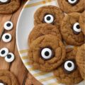 Cinnamon Sugar Pumpkin Cyclops Cookies - These soft, chewy pumpkin Cyclops cookies with a crunchy cinnamon sugar coating are a spooky and adorable treat that everyone will love. They are made with canned pumpkin and a generous amount of ground cinnamon, giving them a unique flavor that is perfect for the spookiest season of the year. These cookies are sure to bring a smile to everyone who tries them. But beware, these cookies are so good that they'll disappear in a blink of an eye.
