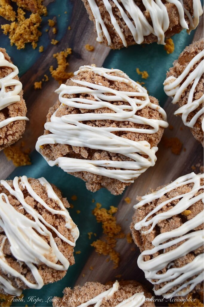 Pumpkin Streusel Breakfast Squares - These breakfast squares are an easy and delicious way to start your day. Whether you make them in a brownie bar pan or a muffin tin, you'll be amazed at the transformation of an ordinary box of spice cake mix into something extraordinary. The sweet pumpkin flavor is enhanced with a cinnamon streusel topping and a decadent powdered sugar drizzle. With the simple ingredients and minimal prep time involved in making these delightful breakfast squares, you'll be sure to have a delicious start to your day.