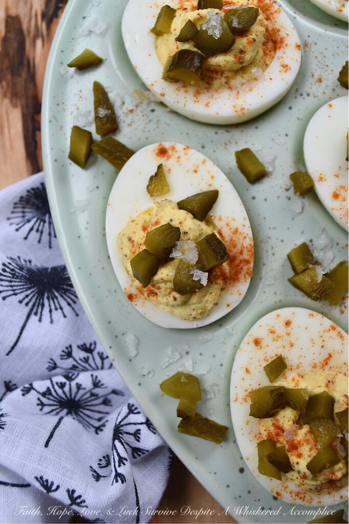Southern Sweet Pickle Deviled Eggs - Southern sweet pickle deviled eggs are a great choice for any occasion, whether you're in need of a quick snack, a side dish, or perhaps an appetizer to start off a meal. The combination of mayonnaise, pickle juice, and dry mustard creates a tangy and savory flavor that is perfectly balanced with a touch of sweetness. And, the garnish of diced sweet pickle, paprika, and flaky sea salt adds just the right hint of flavorful salty sweetness to make these deviled eggs absolutely irresistible.