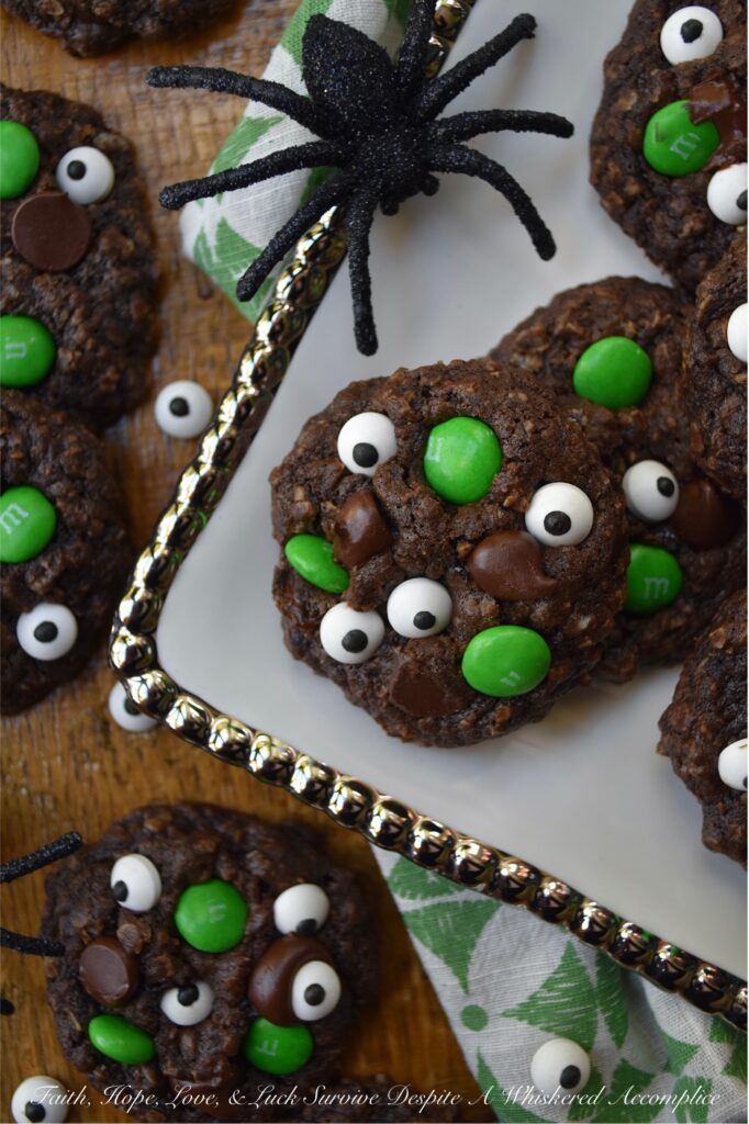 Green-Eyed Monster Chocolate Oatmeal Cookies - Not only do these Green-Eyed Monster Chocolate Oatmeal Cookies look super-adorable with their candy eyeballs and green M&M’s, but they’re also loaded with dark chocolate chips for a sweet tasty chocolaty bonus. These not-so-scary chocolate oatmeal cookies are sure to delight both kids and adults alike. Serve them with a glass of cold milk for a truly festive treat.