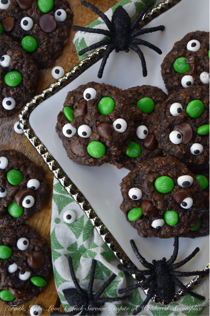 Green-Eyed Monster Chocolate Oatmeal Cookies - Not only do these Green-Eyed Monster Chocolate Oatmeal Cookies look super-adorable with their candy eyeballs and green M&M’s, but they’re also loaded with dark chocolate chips for a sweet tasty chocolaty bonus. These not-so-scary chocolate oatmeal cookies are sure to delight both kids and adults alike. Serve them with a glass of cold milk for a truly festive treat.