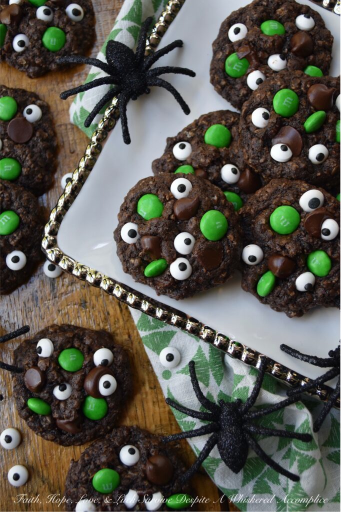 Green-Eyed Monster Chocolate Oatmeal Cookies - Not only do these Green-Eyed Monster Chocolate Oatmeal Cookies look super-adorable with their candy eyeballs and green M&M’s, but they’re also loaded with dark chocolate chips for a sweet tasty chocolaty bonus. These not-so-scary chocolate oatmeal cookies are sure to delight both kids and adults alike. Serve them with a glass of cold milk for a truly festive treat.