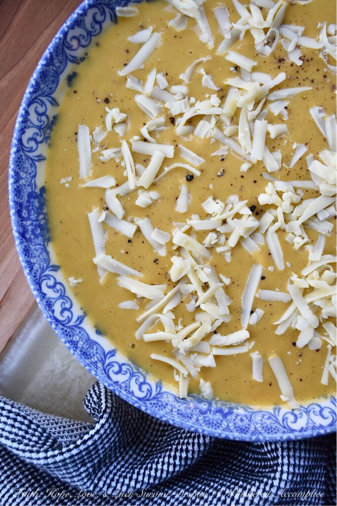 Creamy Autumn Harvest Cider Sweet Potato Soup - This creamy sweet potato soup is the perfect fall harvest recipe to enjoy on a busy weeknight or activity-loaded weekend. Sweet potatoes, celery, apple cider, and ground sage combine to create a warm, slightly sweet, comforting autumn flavor that's sure to be an instant hit. Top each bowl with a generous sprinkle of gouda cheese for an extra touch of richness and you have the perfect easy-to-make meal to enjoy on any crisp fall evening.