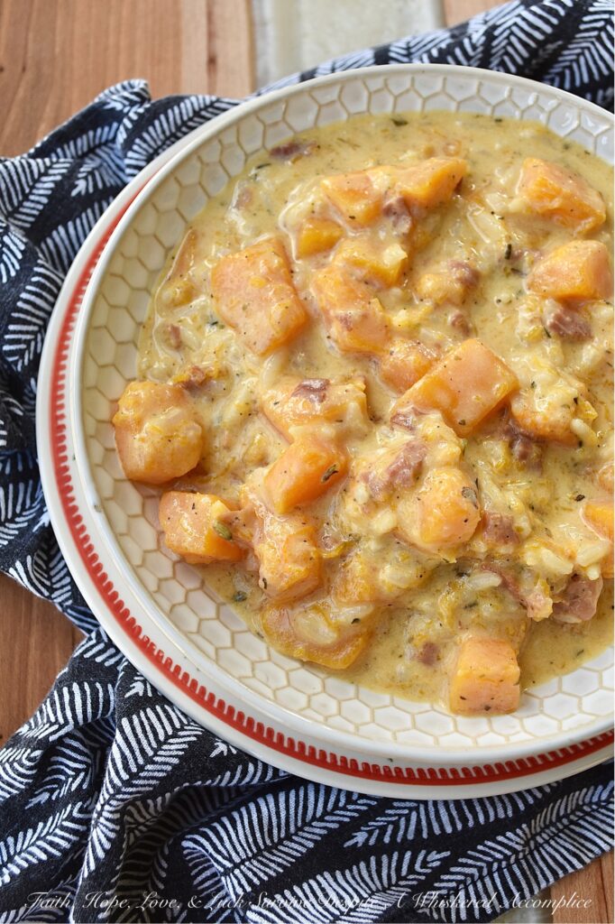 Creamy Prosciutto & Butternut Squash Rice Soup - This easy-to-make one-pot soup is a great option for a quick weeknight meal. Made with Herbes de Provence, diced butternut squash, and salty prosciutto, this soup is almost sure to please with its creamy, rich, decadent flavor. Serve this delicious soup with a crusty piece of bread for a warm, comforting, satisfying cold-weather meal.
