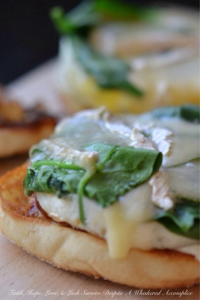 Fig and Brie Breakfast Sandwiches - This is no ordinary bacon, egg, and cheese sandwich recipe, these sandwiches take things to a whole new level. It all starts with perfectly toasted English muffins, slathered with a generous amount of fig jam or preserves. Next comes Canadian bacon, perfectly fried eggs, a handful of fresh spinach leaves, and a generous amount of melted brie cheese. This is the type of sandwich you won't mind waking up early for.